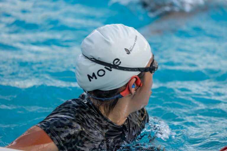 Lap swimmer in pool